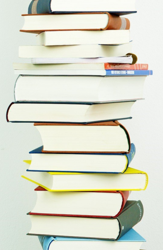 Tall Stack of Books with White Background